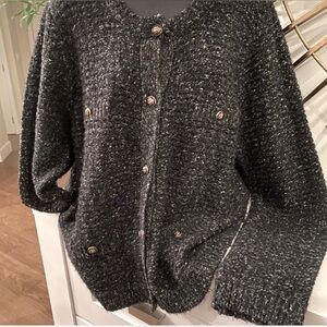 Classic style ladies cardigan 
Heathered black and white knit